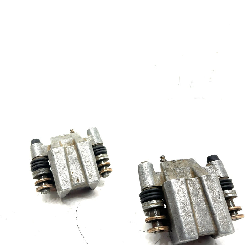 88-99 Polaris Trail Boss 250 2x4 OEM Front Brake Caliper Set 5133879 AP128