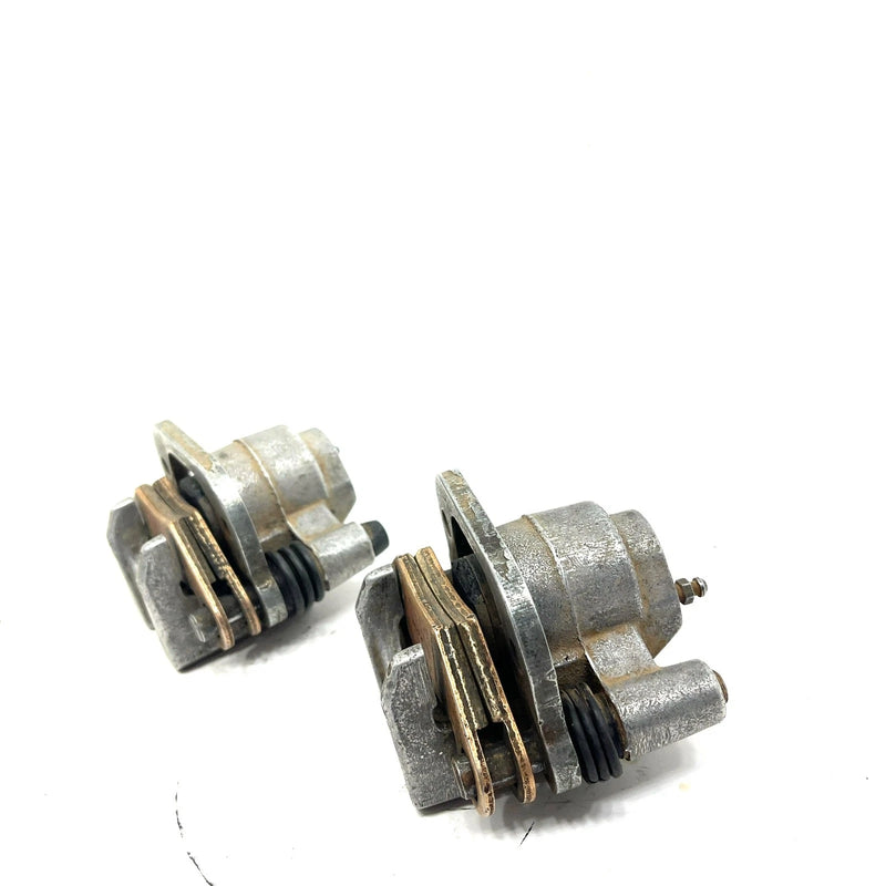 88-99 Polaris Trail Boss 250 2x4 OEM Front Brake Caliper Set 5133879 AP128
