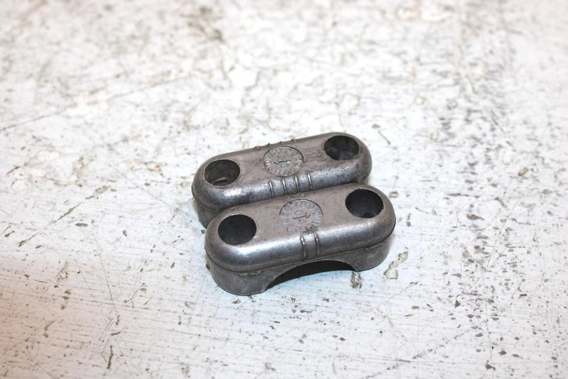 2006 John Deere  Buck 650 Oem Handlebar Clamp Set Of 4 506151622 AJ0