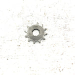 1986 Suzuki Quadrunner 185 OEM 12T Engine Sprocket 27511-24400 AS33