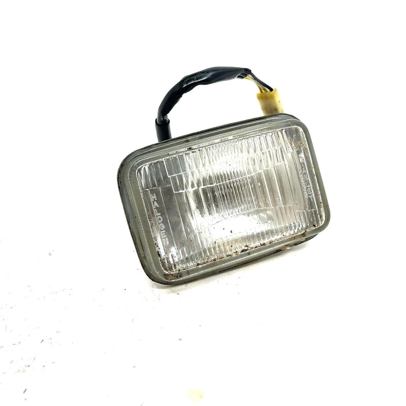 1987 Suzuki Quadrunner 4WD LT4WD OEM Headlight 35100-19B03 AS28