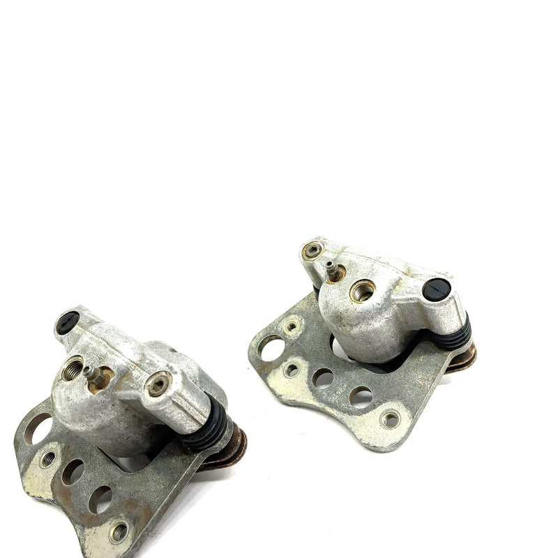 02-04 Polaris Sportsman 700 OEM Front Brake Caliper Set 1910681 AP190