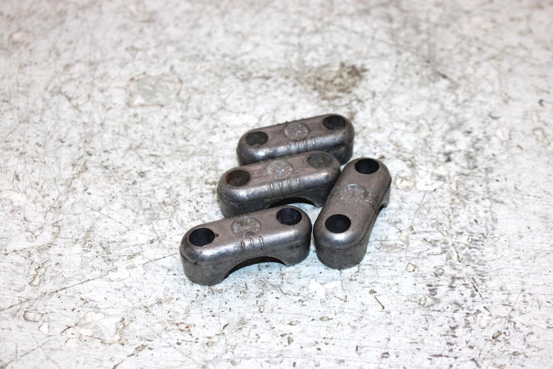 2006 John Deere  Buck 650 Oem Handlebar Clamp Set Of 4 506151622 AJ0