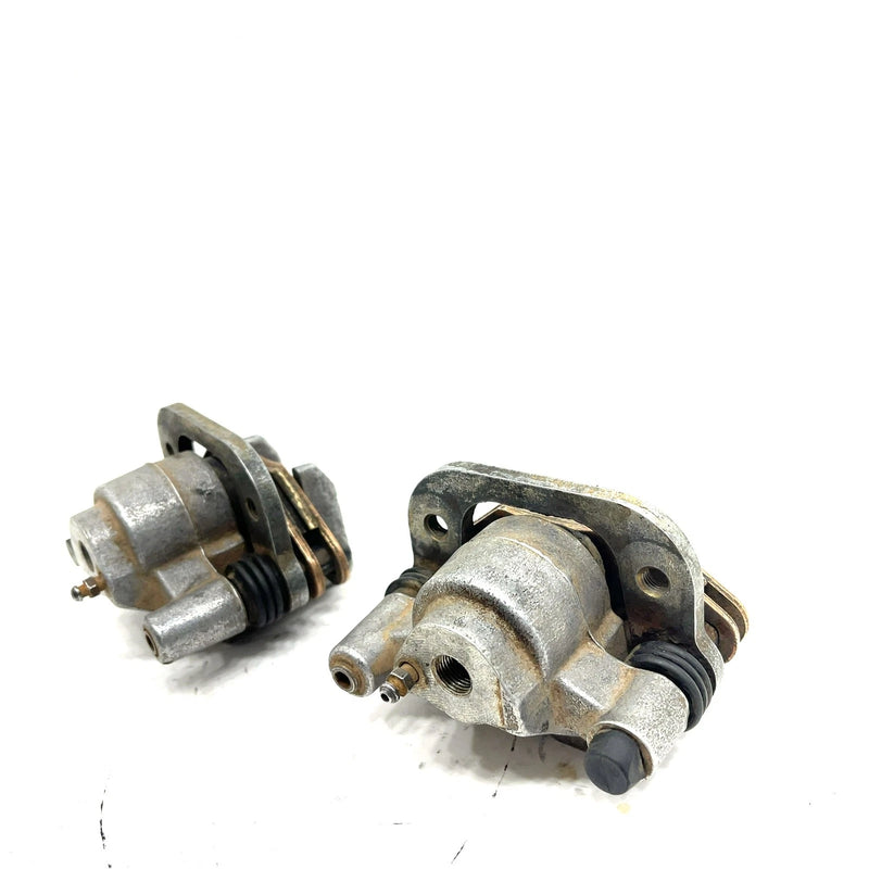 88-99 Polaris Trail Boss 250 2x4 OEM Front Brake Caliper Set 5133879 AP128