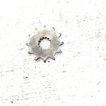 1986 Suzuki Quadrunner 185 OEM 12T Engine Sprocket 27511-24400 AS33