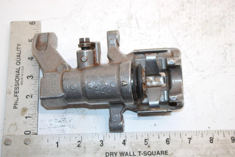 2004 Honda Fourtrax Rincon Oem Rear Brake Caliper 43150-HN8-006 AH2
