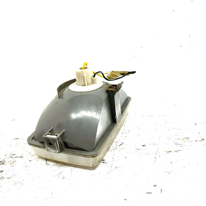 84-87 Suzuki Quadrunner 185 OEM Headlight 35100-18A21 AS0