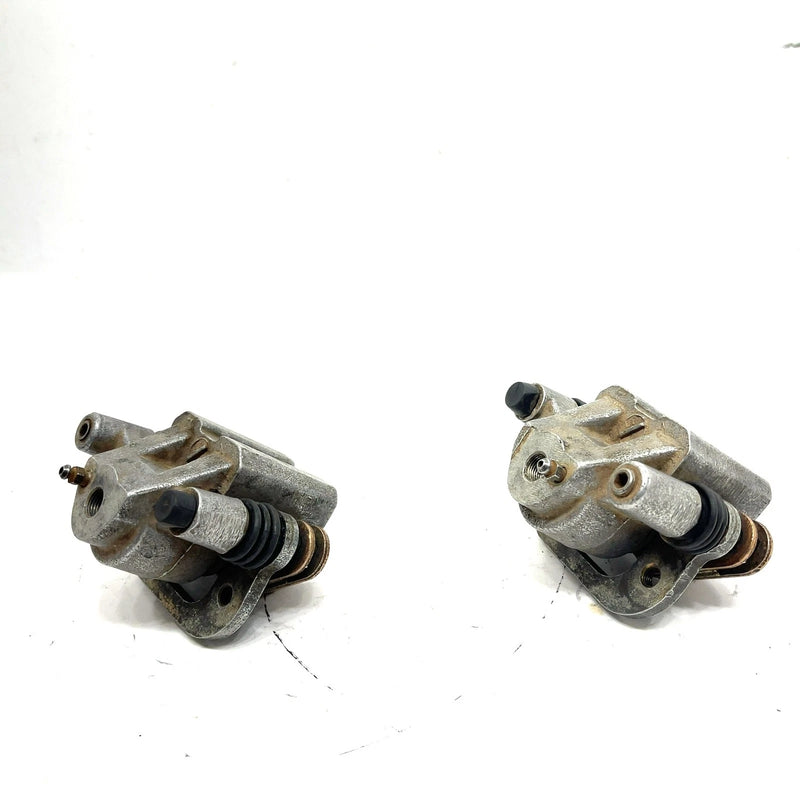 88-99 Polaris Trail Boss 250 2x4 OEM Front Brake Caliper Set 5133879 AP128