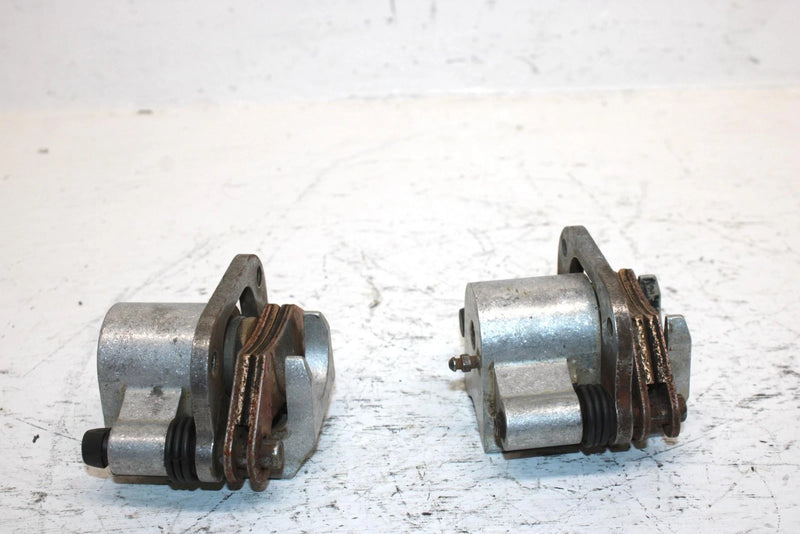 1999 Polaris Sportsman 325 Oem Front Brake Caliper Set 5133880 5133879 AP16